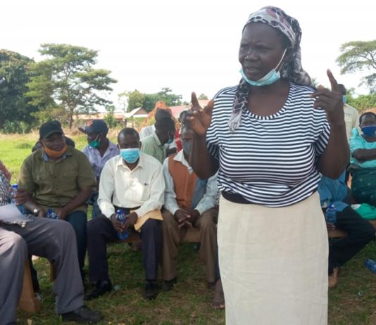 Environmental activists in a consultative meeting with the EACOP project affected people in Kitenga Mubende district