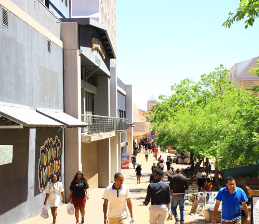 Lunch hour in Windhoek's Central Business District (CBD) with residents walking through Post Street Mall, Windhoek's main business center..